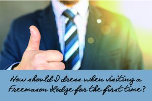 How should I dress when visiting a Freemason Lodge for the first time?